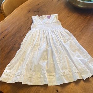 Angel Fish sweet white eyelet dress with tie back and front smocking. Size 6X